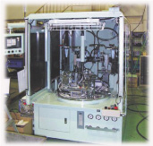Two station brazer - Brazing on one fixture while loading another